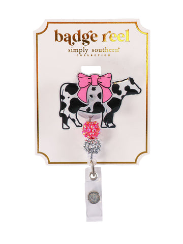 Black Cow with Bow Badge Reel