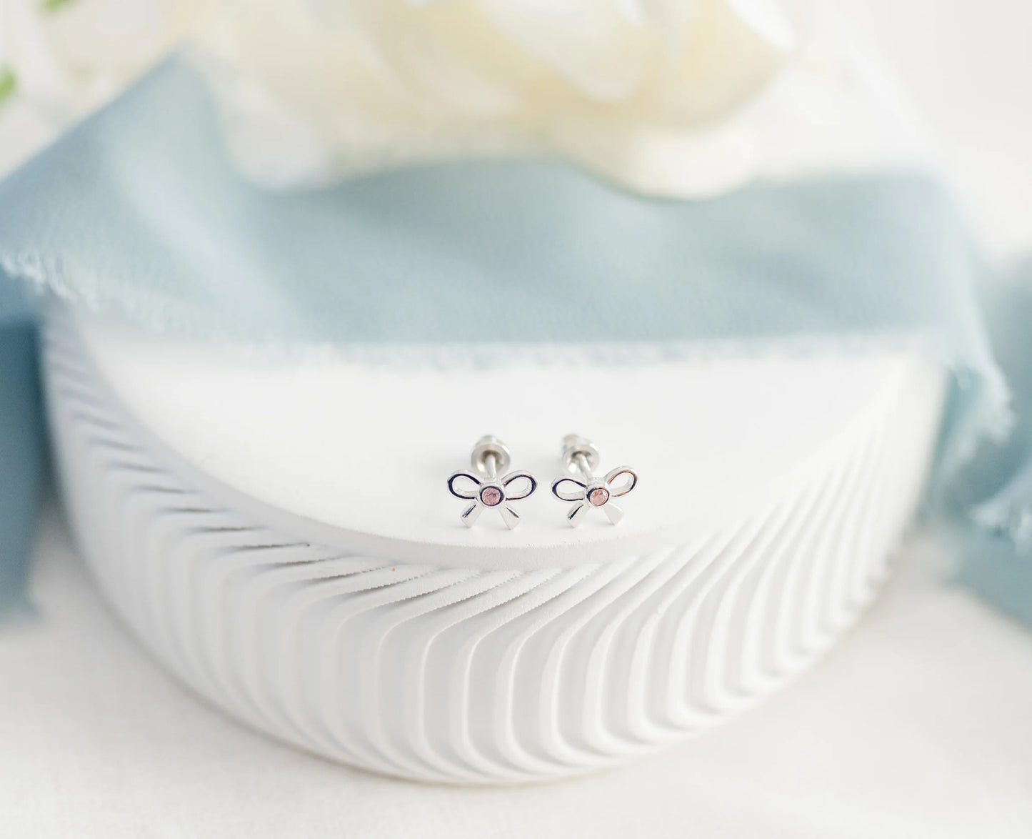 Sterling Silver Bow Earrings with Pink CZs